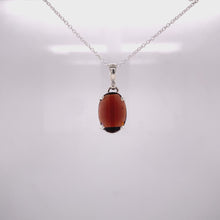 Load and play video in Gallery viewer, Garnet and Sterling Silver Pendant
